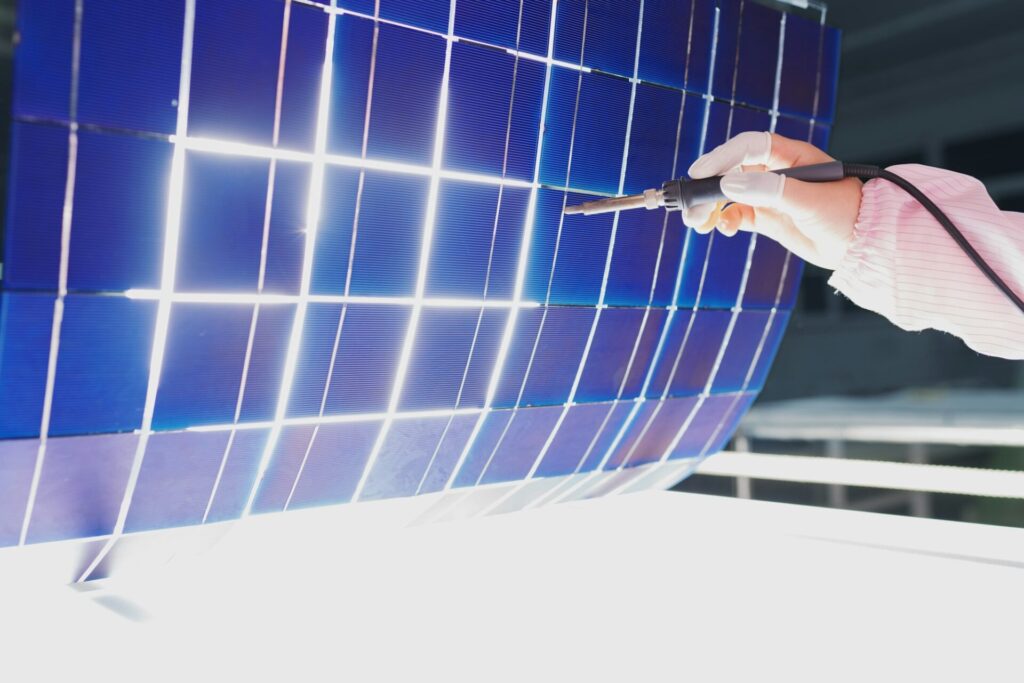 Female worker in solar panel assembly factory, Solar Valley, Dezhou, China